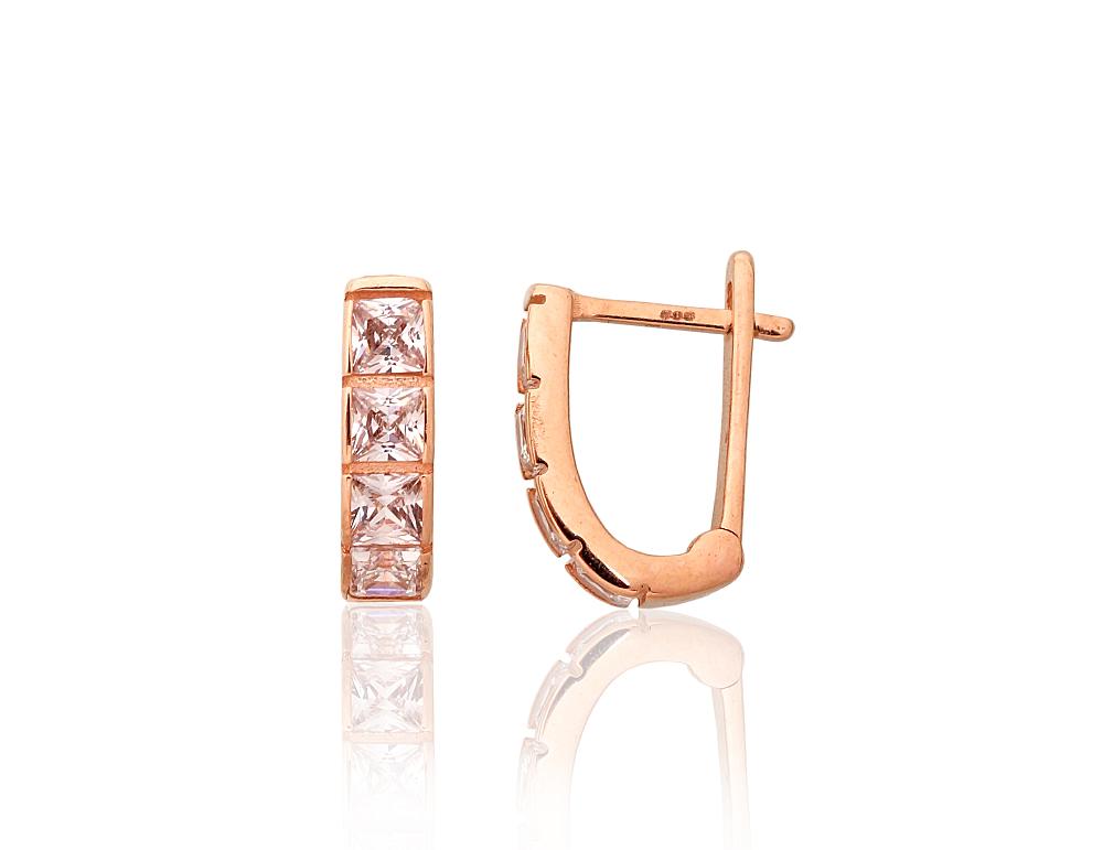 Gold earrings with 'english' lock