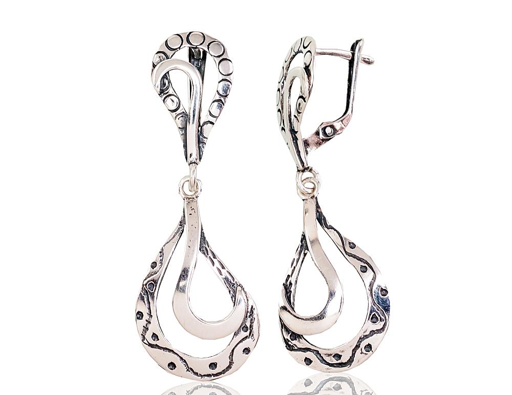 Silver earrings with 'english' lock